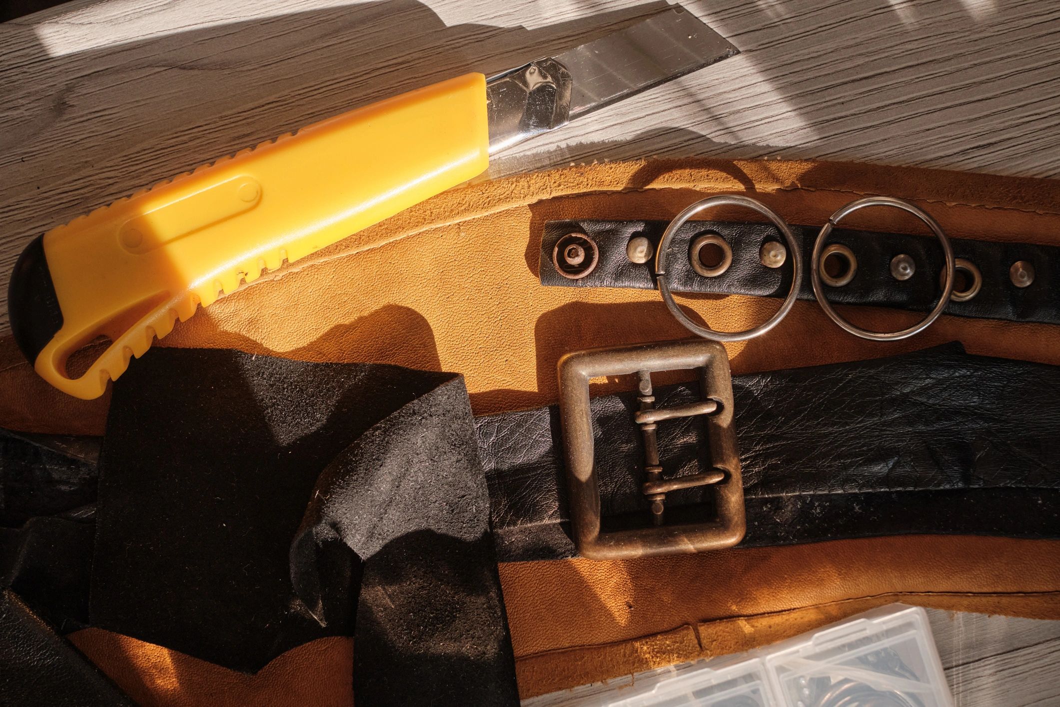 Leathercraft workspace with armor making materials