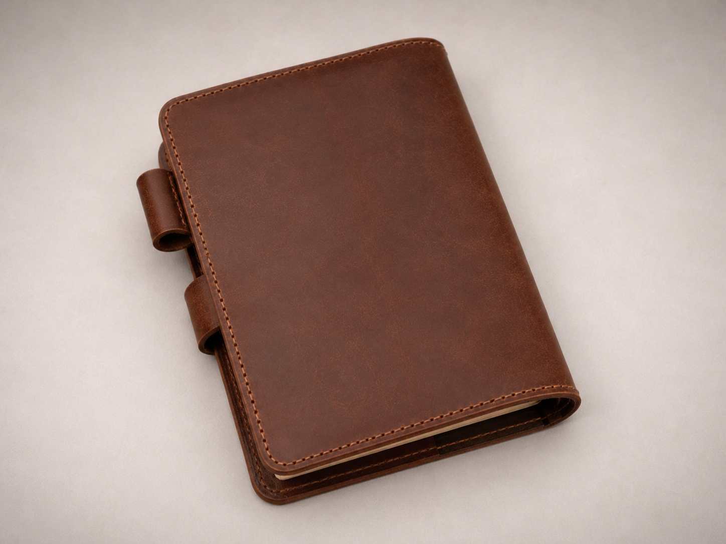 Angled - Old Line Crafts & Designs A premium brown leather journal cover with a clean exterior back view