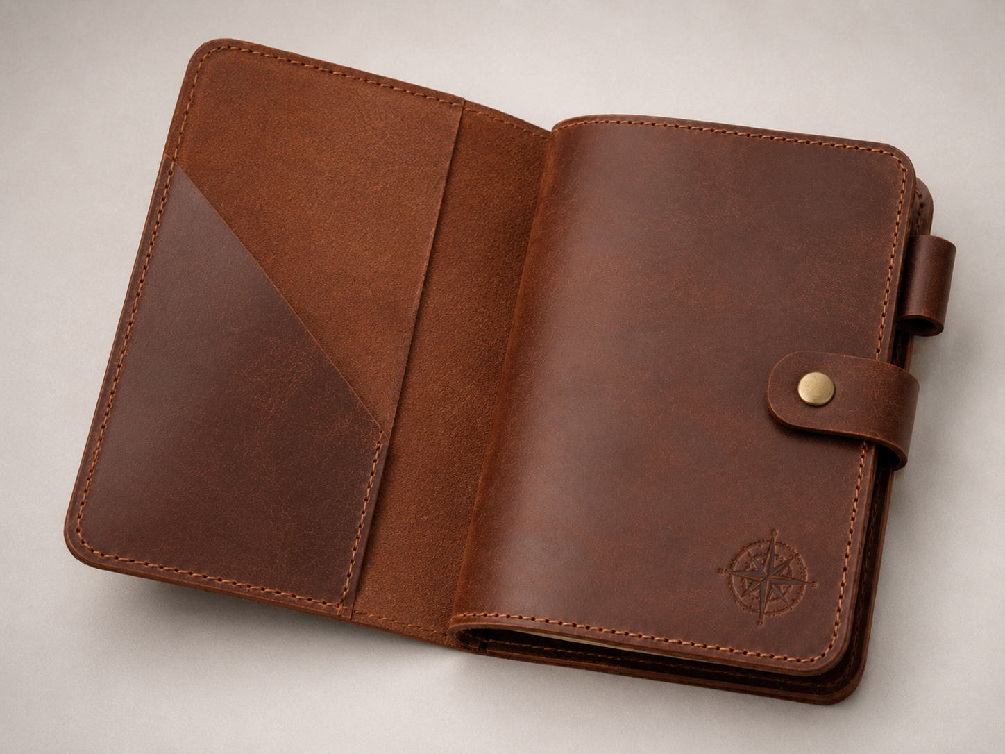 Empty - Old Line Crafts & Designs A chestnut leather travel style journal cover opened to show its wraparound construction notebook sleeves and practical interior layout